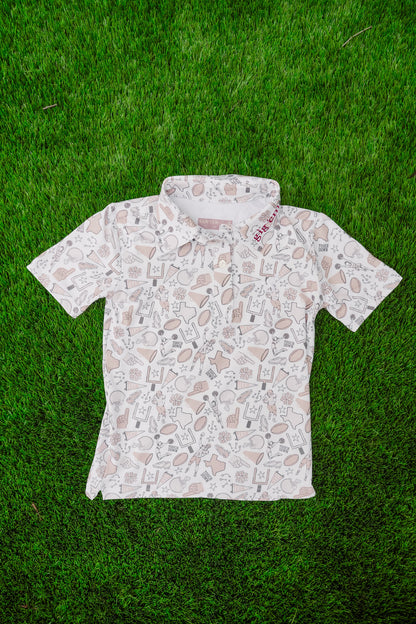 Short-sleeve shirt with a pattern on a grass background