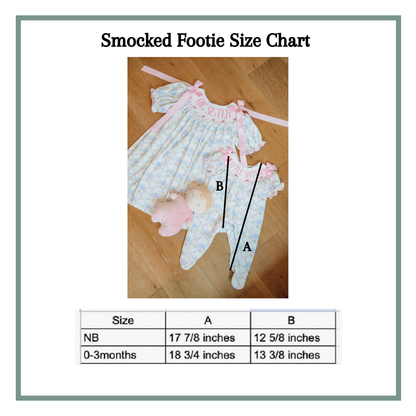 A size chart graphic titled 'Smocked Footie Size Chart' showing a baby smocked footie set laid on a wood floor, with measurement lines labeled A and B and a size table below.